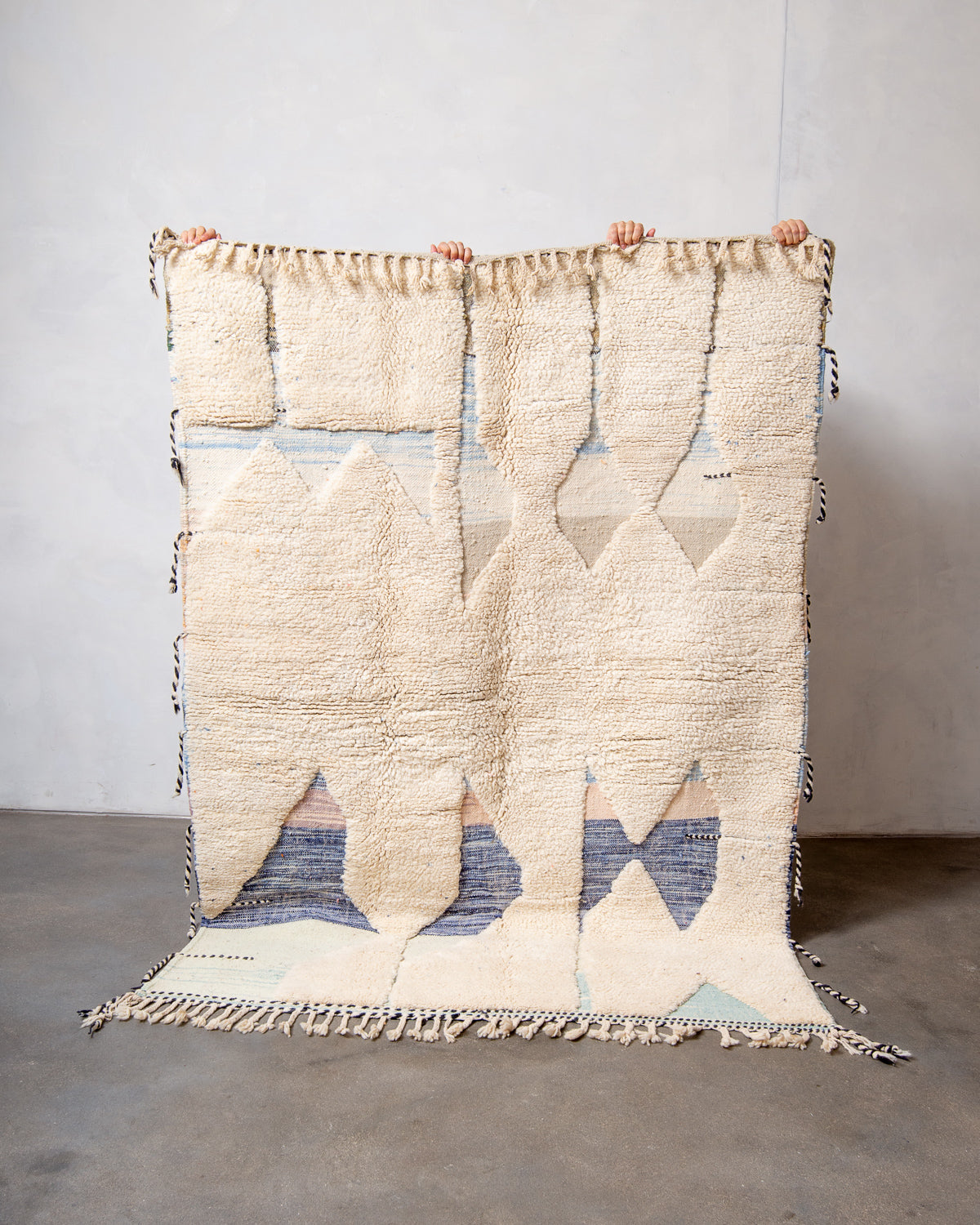 Modern, designer, handcrafted Berber rug from Morocco. Beniourain carpet with beautiful colours and patterns and fluffy wool texture.